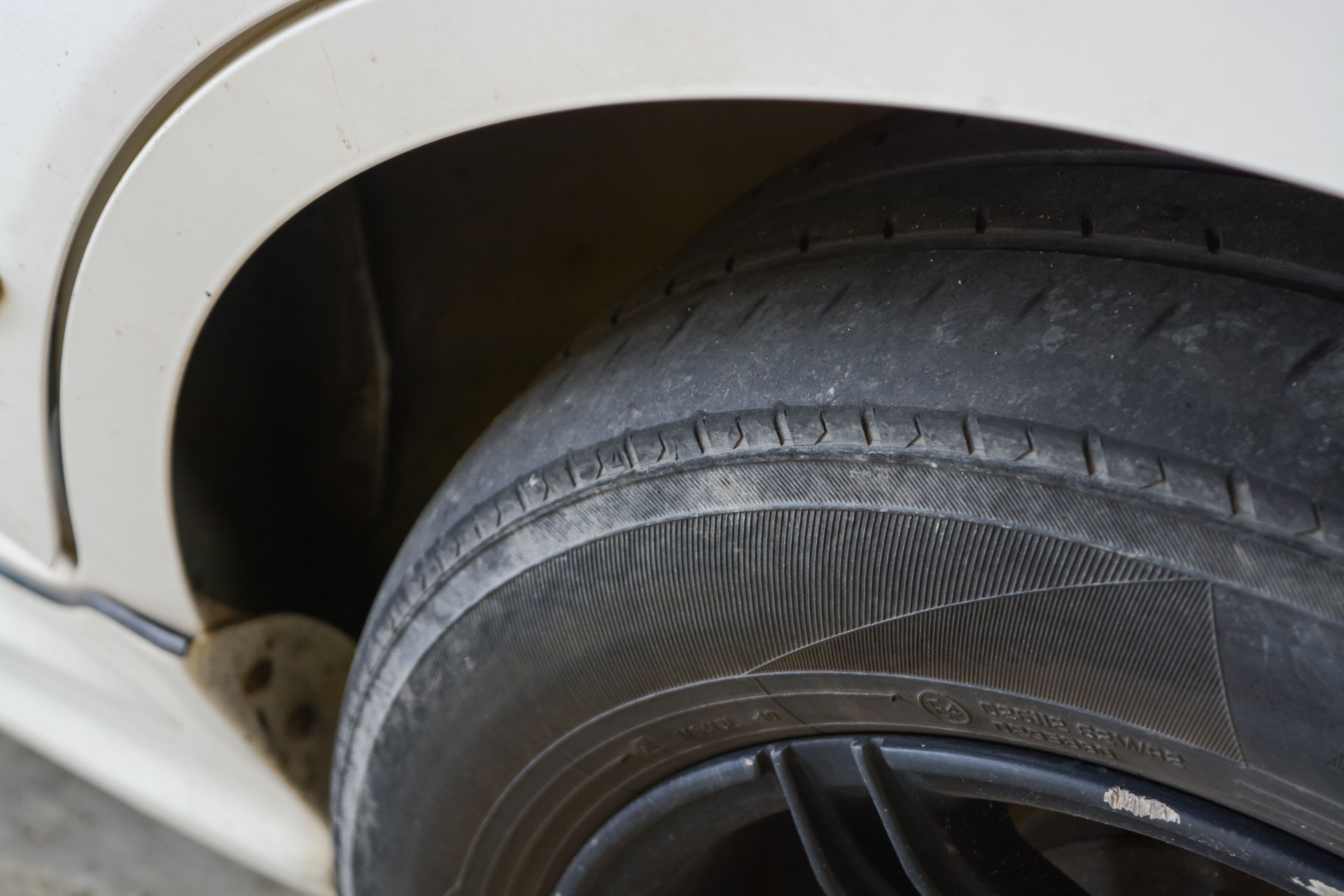 Klang, Malaysia: October 16th, 2024- The tread on the tire is significantly worn down, with little to no tread depth remaining.